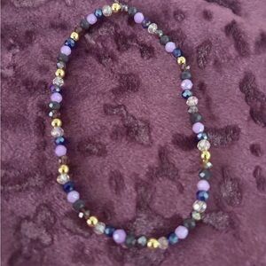 Elegant Purple and Gold Beaded Bracelet